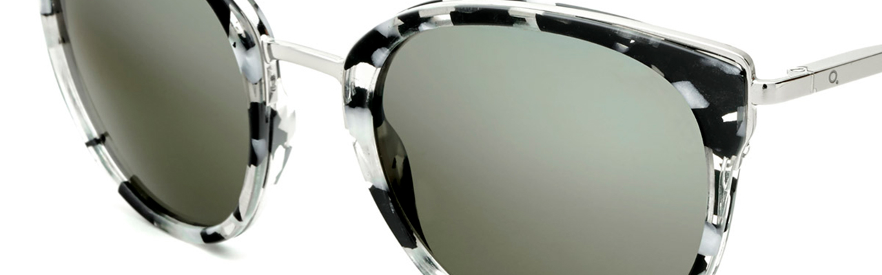 pair of sunglasses with frosted lenses and black-and-white pattern